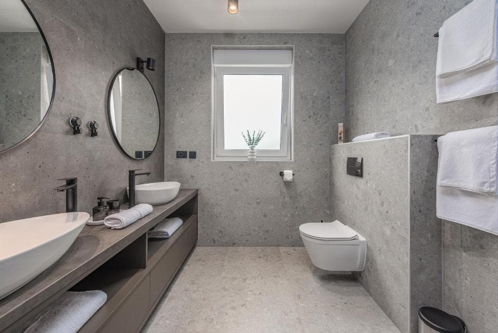 Spacious bathroom with double sink at Villa Maslina