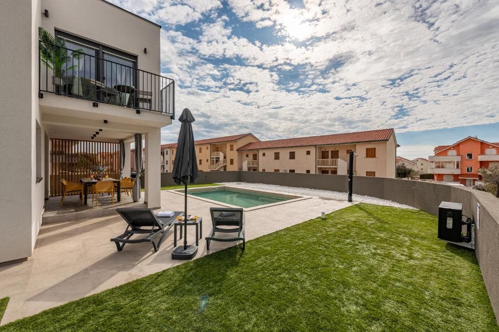 Villa Maslina pool, garden and terrace viewed from the side